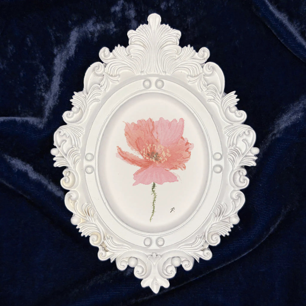 Art fairy magic framed illustration with a white ornate border and pink flower on a dark blue background