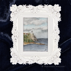 An ornate white baroque-style picture frame displaying a watercolor painting Split Rock lighthouse on a rocky cliff by Lake Superior, set against a dark navy blue velvet background. Signed by P. Pleasant with a "P."