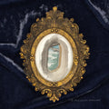 Plane Window framed oval portrait artwork by P. Pleasant Atelier with gold Fairy Magic details