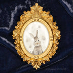 Dust Bunny framed masterpiece by P. Pleasant Atelier with gold oval frame, Art Fairy Magic accents