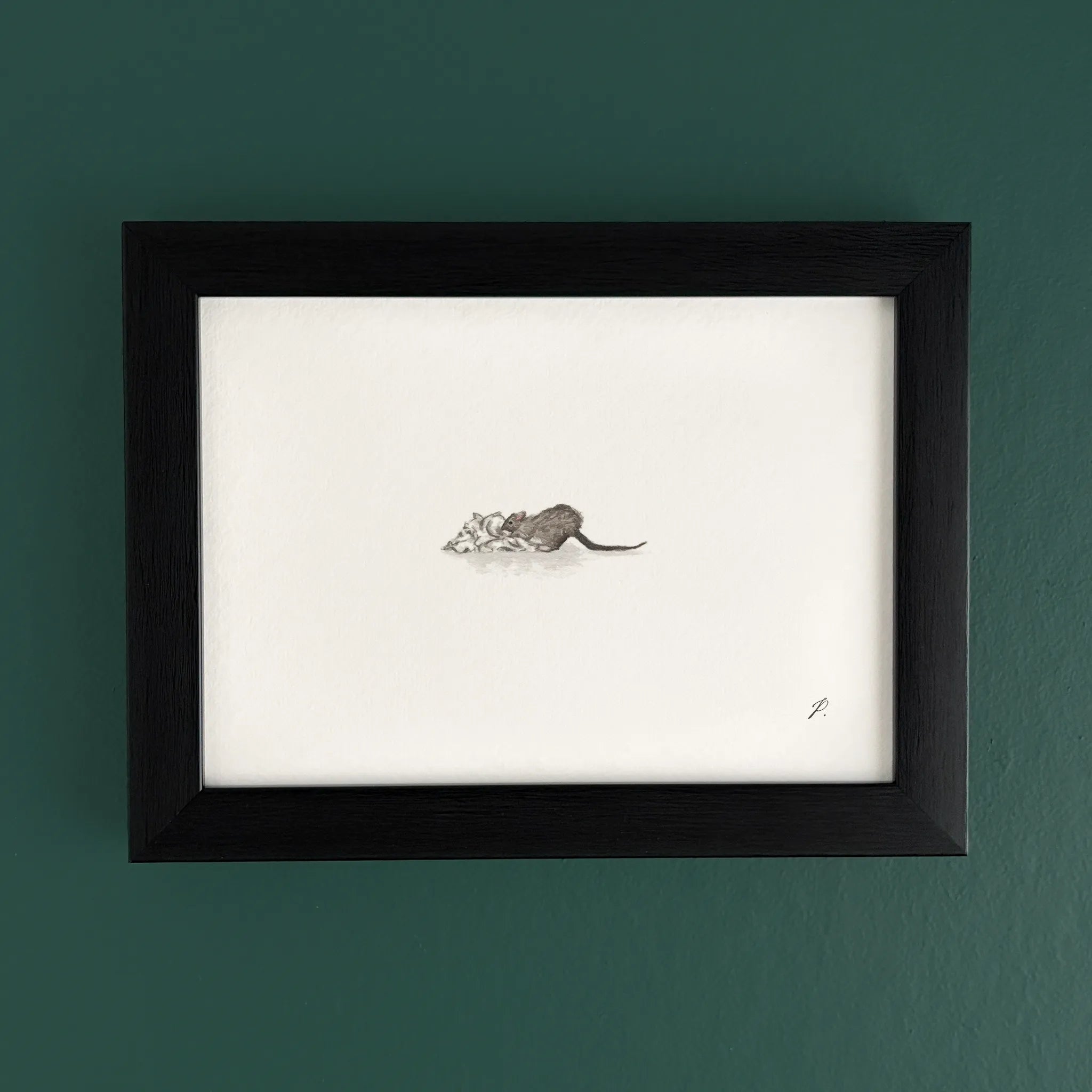 Art fairy magic illustration in a black frame on a teal wall, showing a small mouse near paper