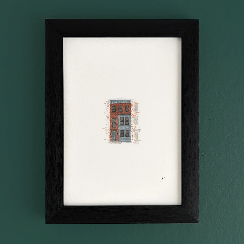 Art fairy magic illustration of a small house with windows, set in a dark wooden frame