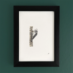 Art fairy magic illustration inside a dark wooden frame, showing a small figure and wand-like shapes