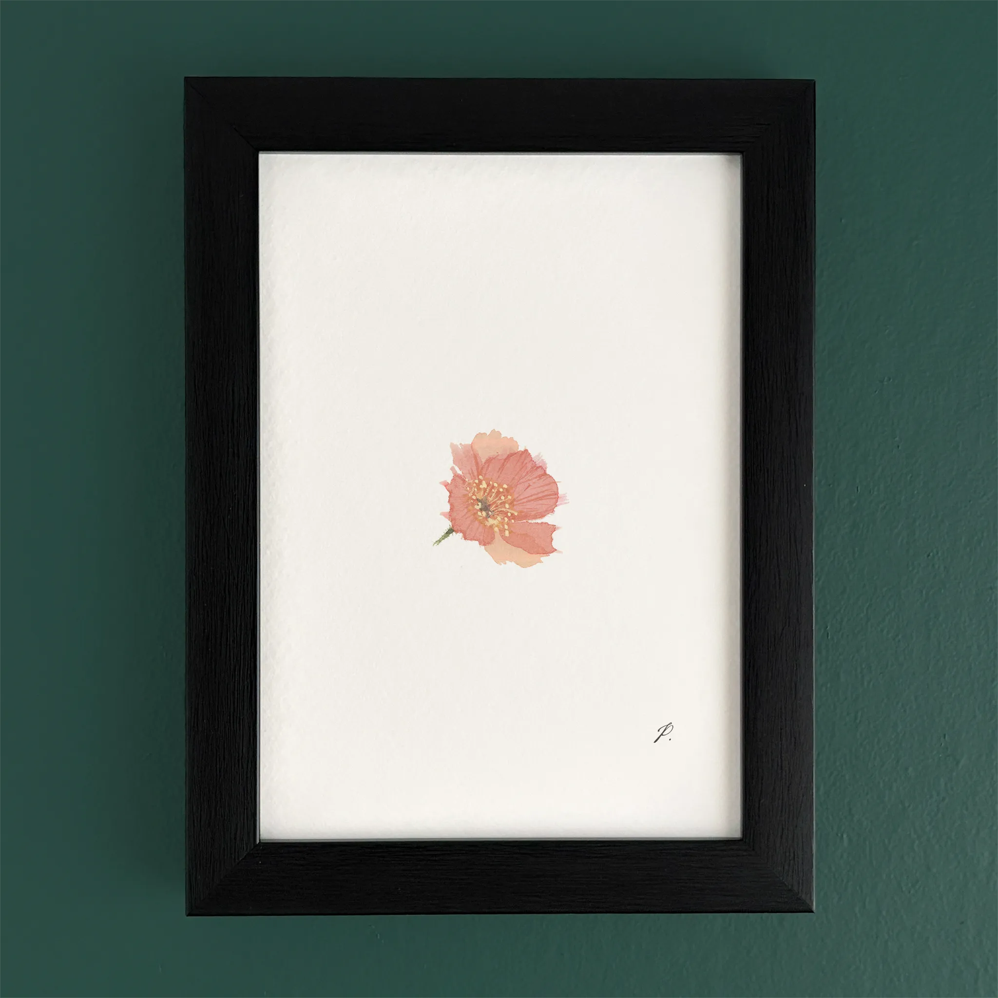 Art fairy magic theme print in a black frame on a green wall, with a small pink flower illustration