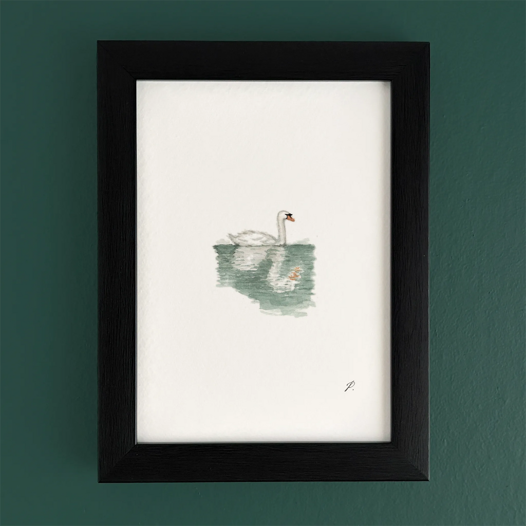 Art fairy magic illustration in a dark wooden frame, showing a swan floating on green water