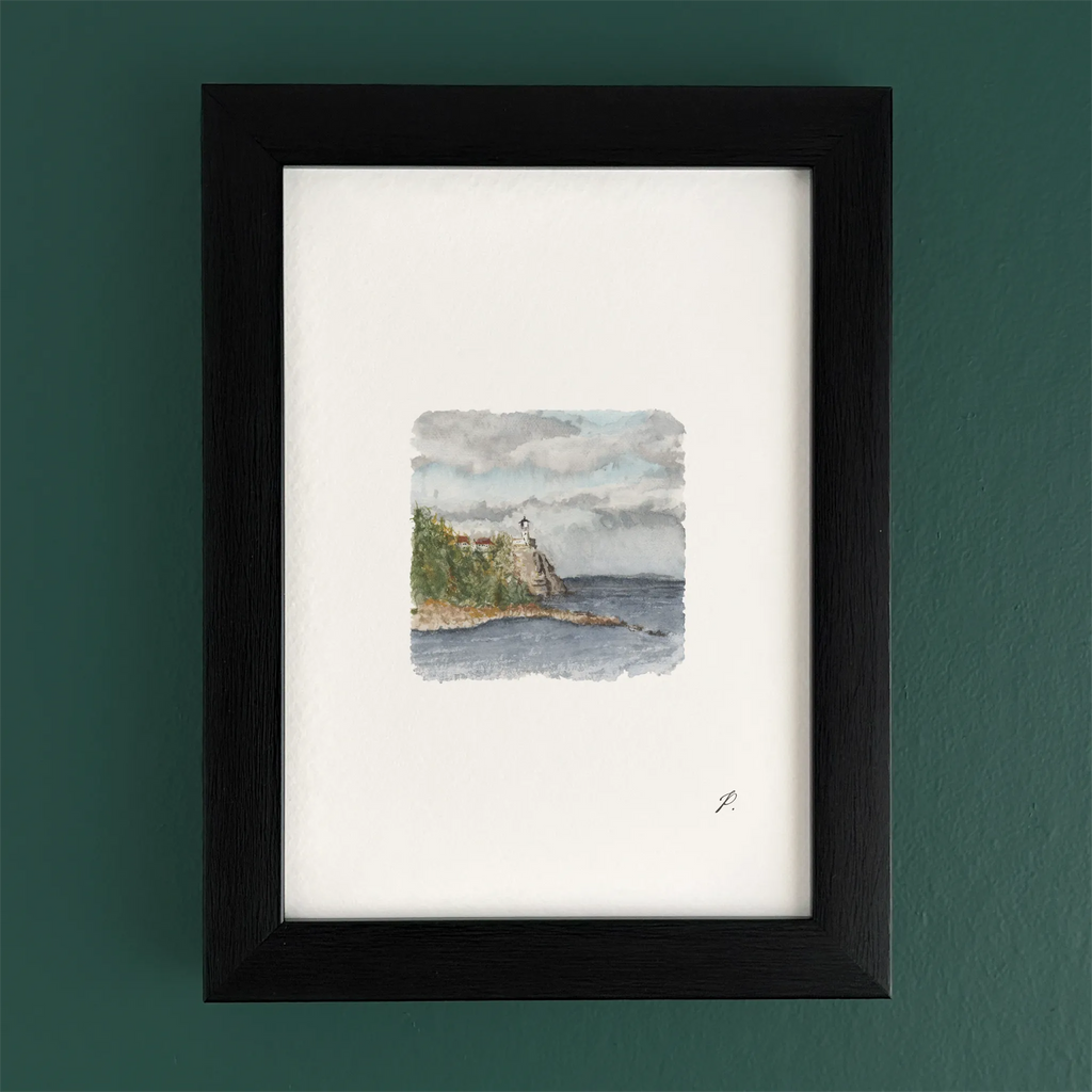 Art fairy magic theme watercolor landscape inside a dark wooden frame on a green wall